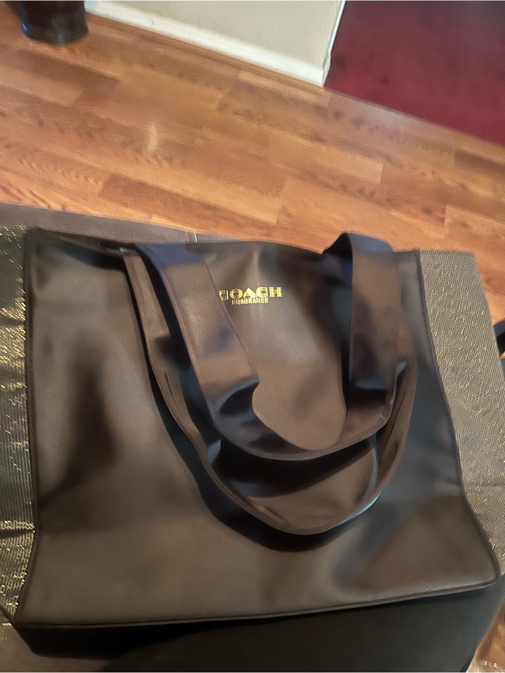Coach Black Duffel Tote with Gold Logo